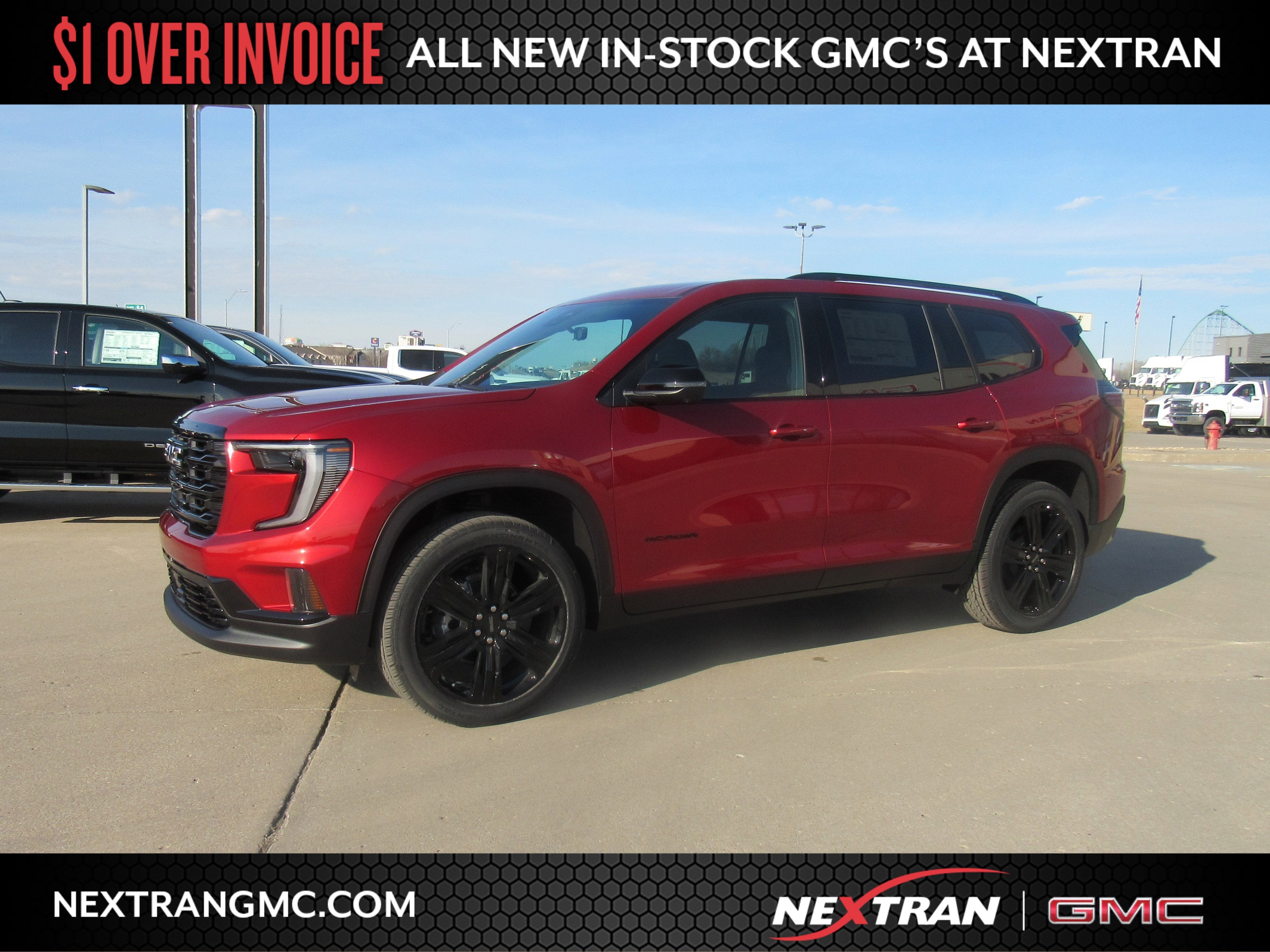 2026 GMC Acadia Elevation in Volcanic Red Tintcoat — front three-quarter view