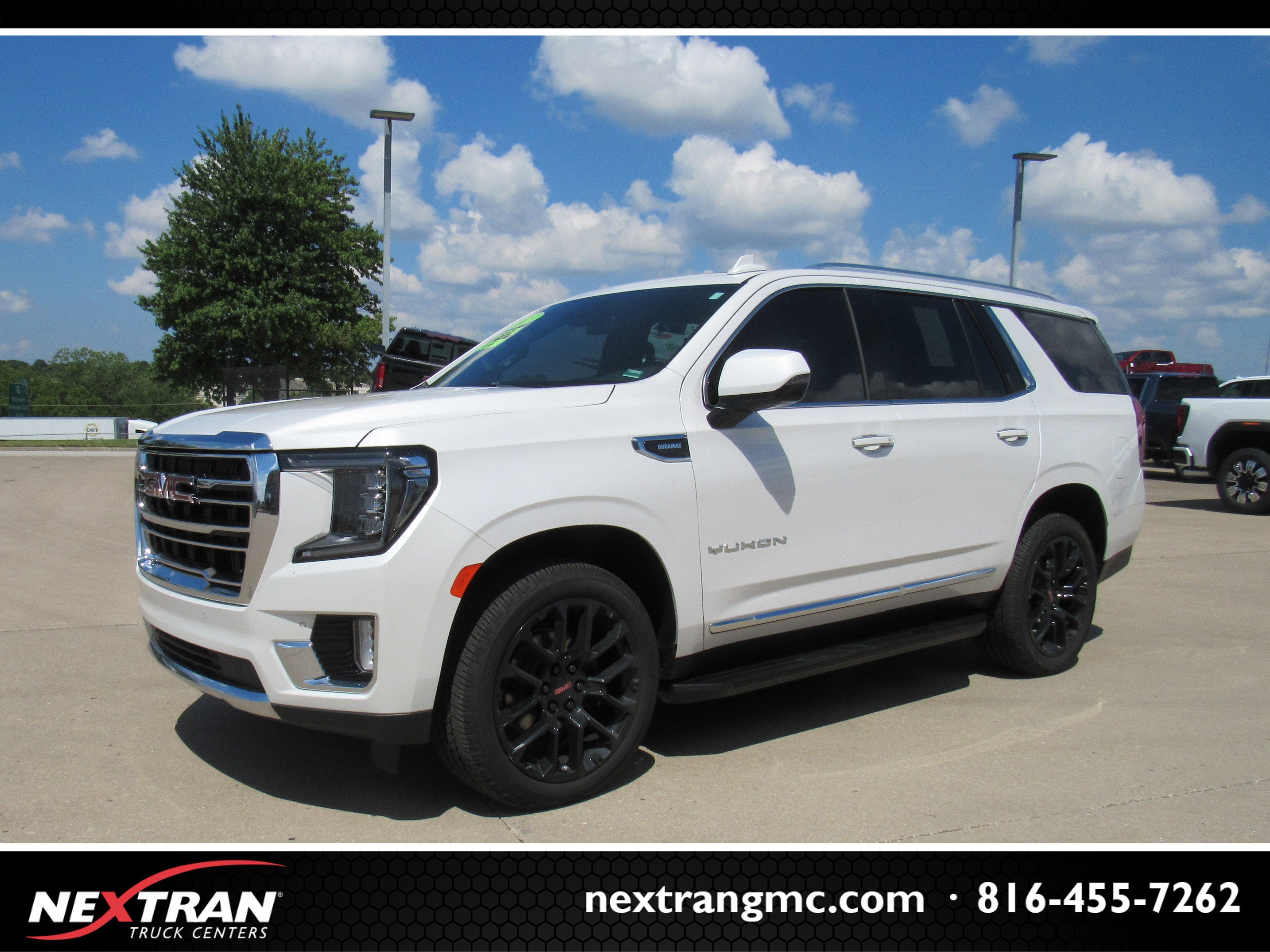 2023 GMC Yukon SLT in White Frost Tricoat — front three-quarter view