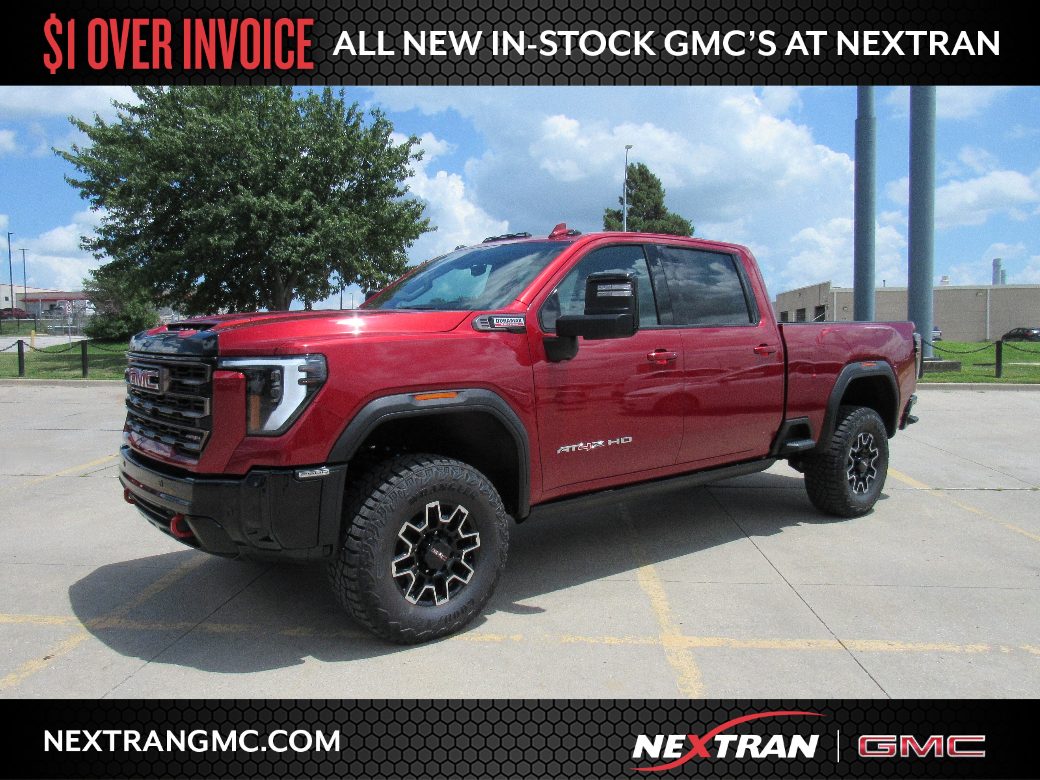 2026 GMC Sierra 2500 HD AT4X in Volcanic Red Tintcoat — front three-quarter view