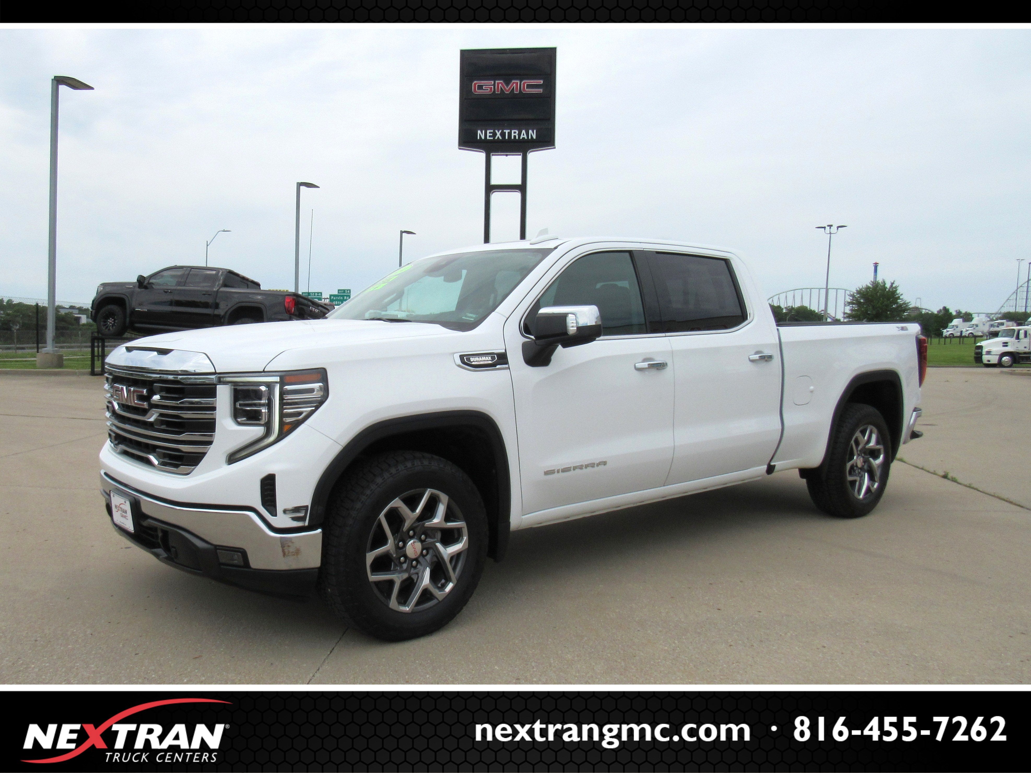 2024 GMC Sierra 1500 SLT in Summit White — front three-quarter view